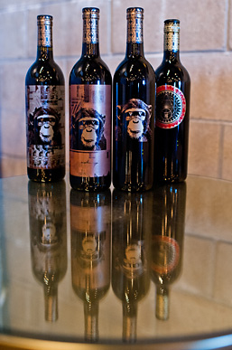 Four bottles of red wine produced by Infinite Monkey Theorem.