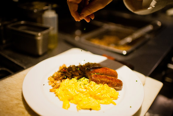 Sausages made in-house at Panzano's are plated for breakfast.