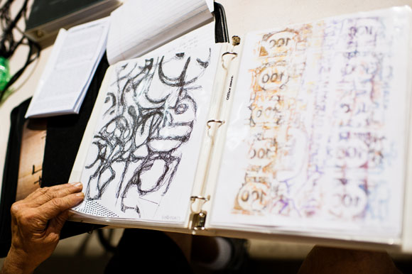 Gonzo pages through his drawings.