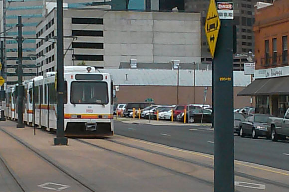 Light rail, shown here at 22nd and Welton streets, passes through Arapahoe Square but doesn't stop there.