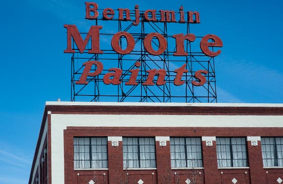 The Benjamin Moore Paints sign decorates Broadway. 