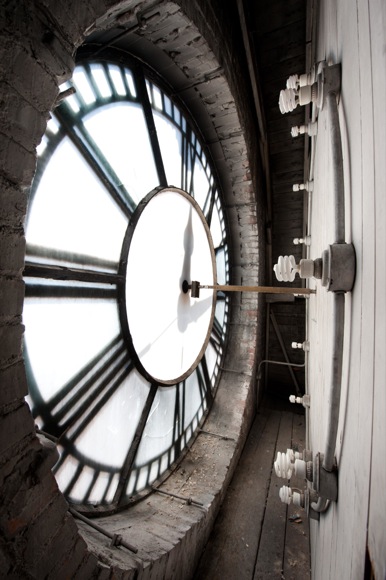 Behind the scenes, the historic clock is lit by compact fluorescent bulbs.