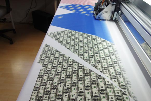 Knotty Tie printed monetary themes on fabric in honor of Lew's visit.