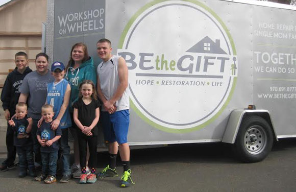 Be the Gift helps a single mom with the Workshop on Wheels program.