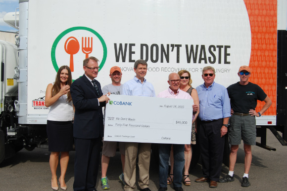 CoBank presents Arlan Preblud of We Don't Waste with a big donation.