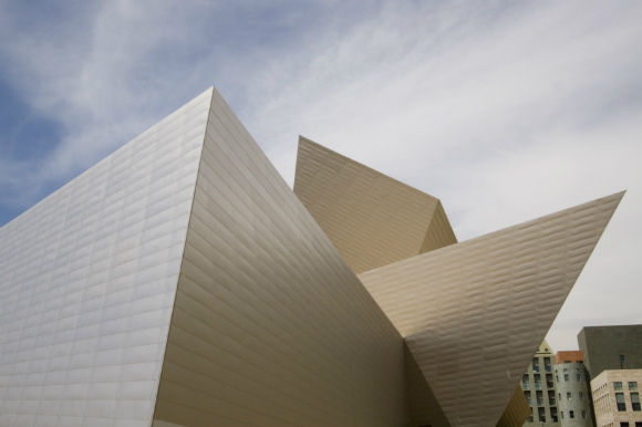 The summit takes place at the Denver Art Museum.