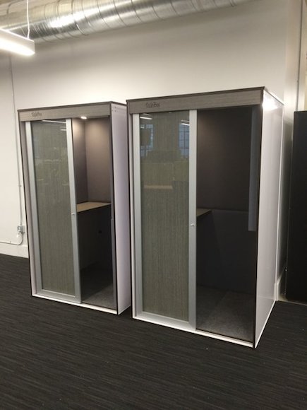 A TalkBox booth offers privacy in busy offices.