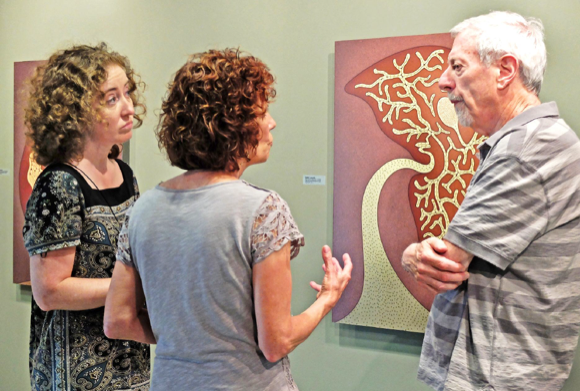 Patrons at the Hyper-Stasis opening.