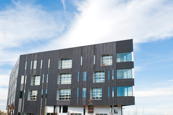 One of the buildings at TAXI has a lot of windows, allowing for natural light to illuminate the office spaces in RiNo.