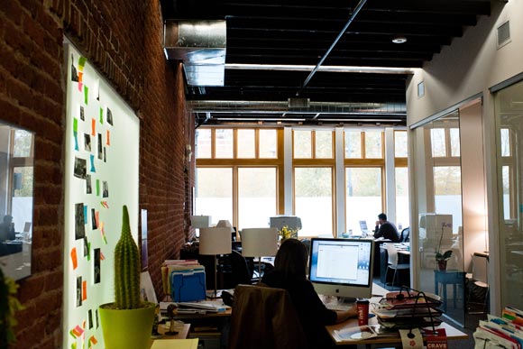 A bank of windows allows a large amount of natural light into the Cactus Building in Central Platte Valley.