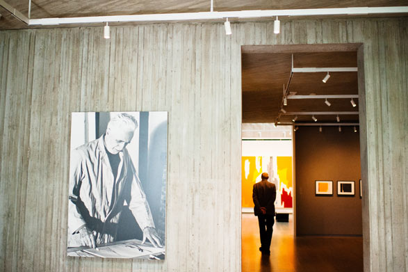 A security guard walks through the Clyfford Still Museum.