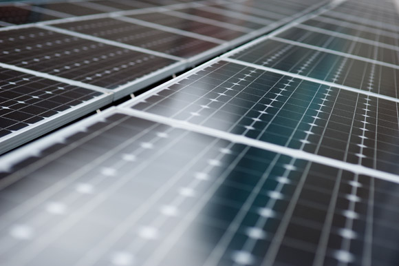 A close-up of the solar panels on the roof of the Rockmount Ranch Wear building in LoDo.