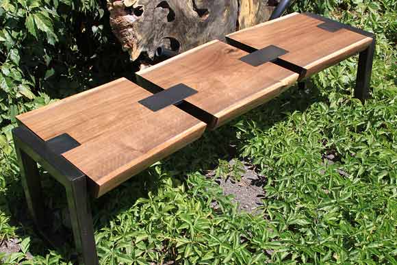  Local black walnut and blackened steel bench designed for the "Design by Colorado" exhibit at Denver International Airport and now on display at the McNichols Building in Civic Center Park.