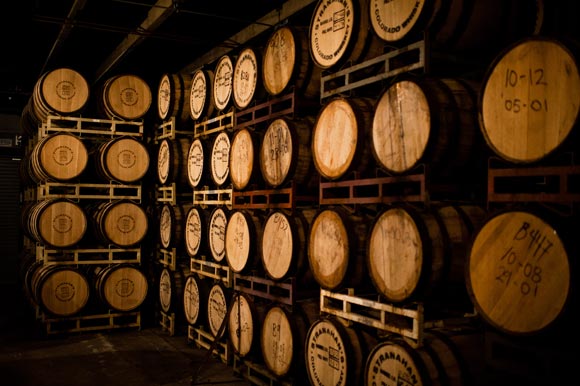 Barrels of whiskey sit in a climate-controlled room at Stranahan's.