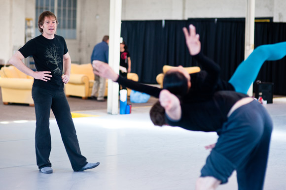 Artistic Director Garrett Ammon watches dancers practice. 