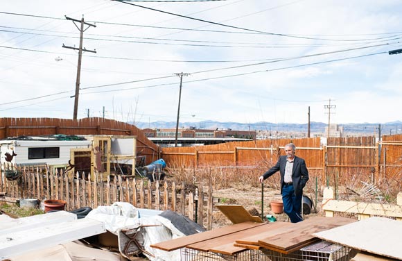 James Bertini stands in his backyard in the Baker neighborhood. 