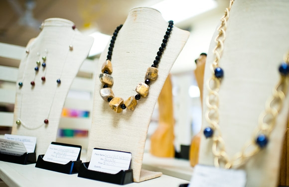 Women's Bean participants make the jewelry for sale. 