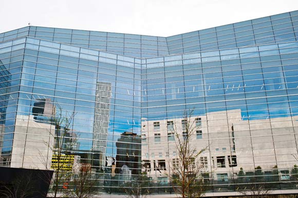 Denver is reflected in the windows of the Lindsey-Flanigan Courthouse.