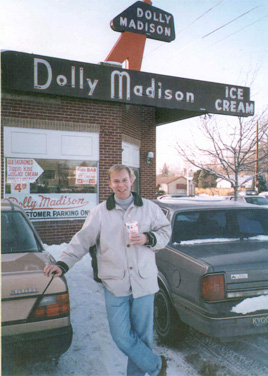 Chipotle Founder Steve Ells poses in front of the Dolly Madison that would become his first restaurant in Denver.