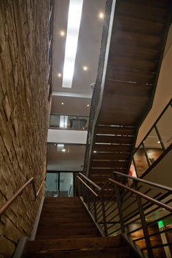 An internal staircase connecting offices.