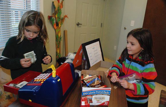 Girls play "store" at Count Me In math camp.