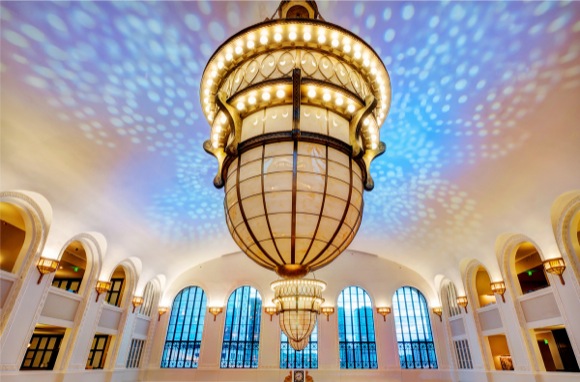 Ornate chandeliers replaced the preceding fluorescent lighting.