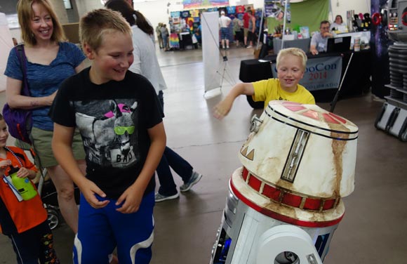 Mitch and Sam goof off with the droid with a bad motivator.