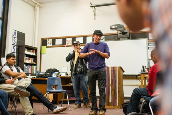 Molina and guest artist Pablo Kee (left) perform at the start of a class at Venture Prep.