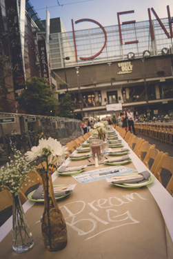 Three quarter-block-long tables were filled with collaborators.