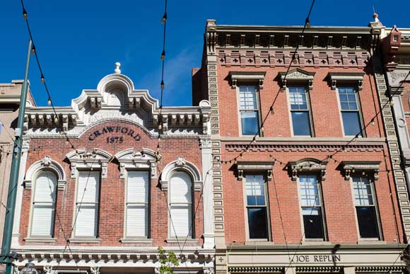 Historic buildings line Larimer Square.