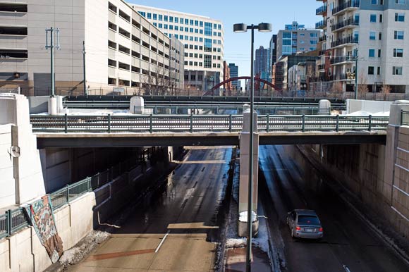 Railroad tracks run across 15th Street downtown.