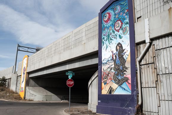  In 2013, PlatteForum ArtLab commissioned the group's first public art installation at Globeville's Lincoln Street Underpass. 