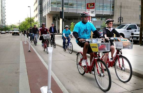 Mayor Hancock and Tami Door on the 15th Street protected bike lane.