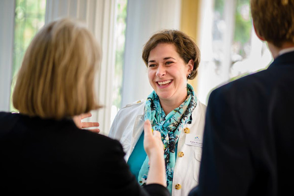 Katie Kramer speaks at an Access Denver event.