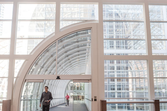 A sky bridge spans Lincoln Street.