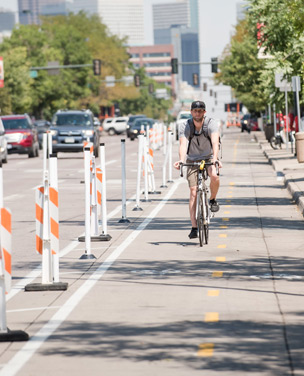As of 2015, Denver had 128 miles of bike lanes.