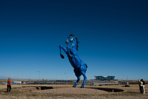 The sculpture is 32 feet tall and weighs 9,000 pounds.