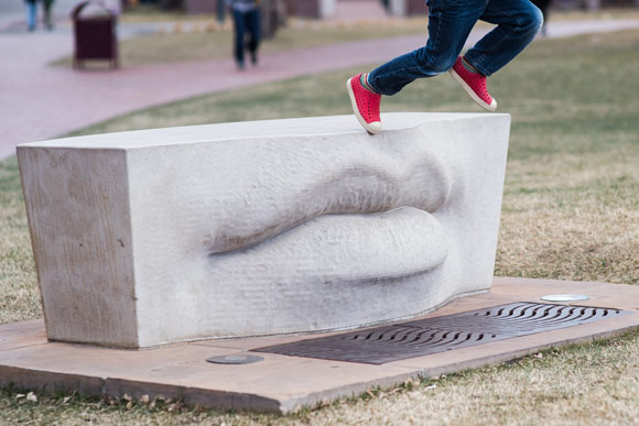 Argent designed a public art display outside of the school's Ritchie Center, called Whispers (2002).