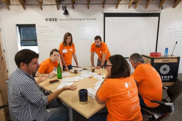 A team works at the Posner Poverty Hack in 2015