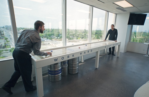 Workers at play at the new Travelers Haven office.